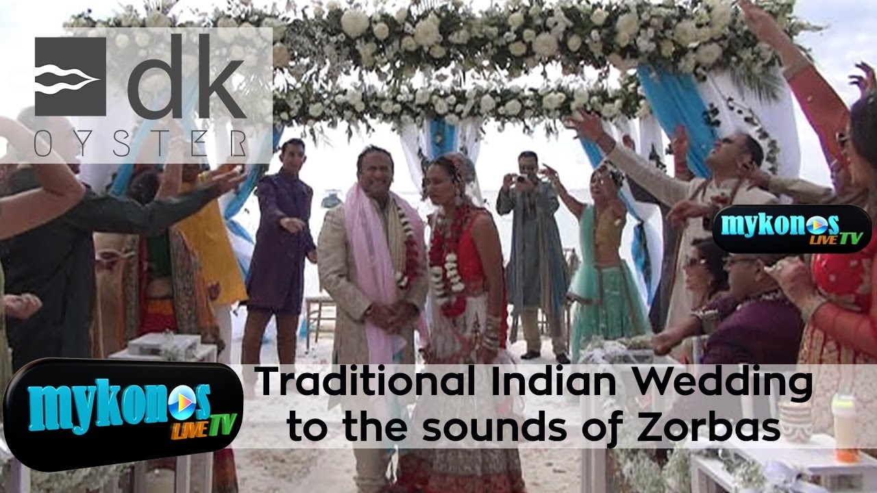 indikos-paradosiakos-gamos-stin-mukono-me-zormpa-xrusopoikilto-nufiko-kai-mpoliko-tsili-img